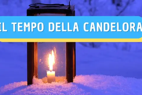 Lanterna con candela accesa nella neve, evoca il proverbio "A Candelora, l'inverno è fora o è quasi fora".